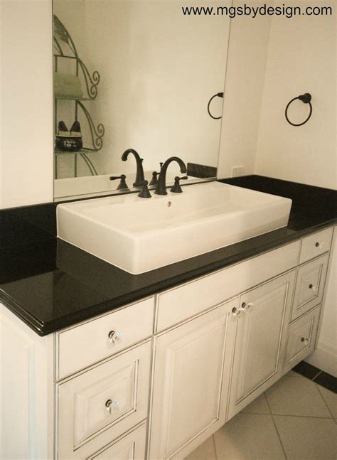 Polished Absolute Black granite countertop with 1 1/2" Ogee Bullnose ...