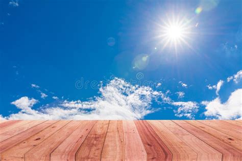 A Picture of a Wooden Desk in Front of an Abstract Background of a Grass Flower Stock Photo ...
