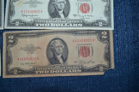 LOT 469. SIX TWO DOLLAR BILLS RED SEAL | EstateSales.org