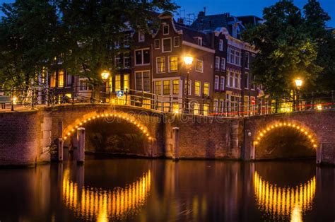 Amsterdam Canals at Night stock photo. Image of lights - 74141430