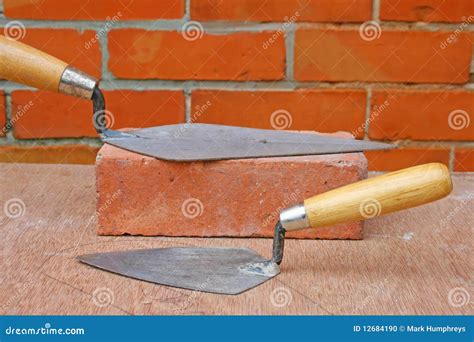 Bricklaying trowels stock photo. Image of construction - 12684190