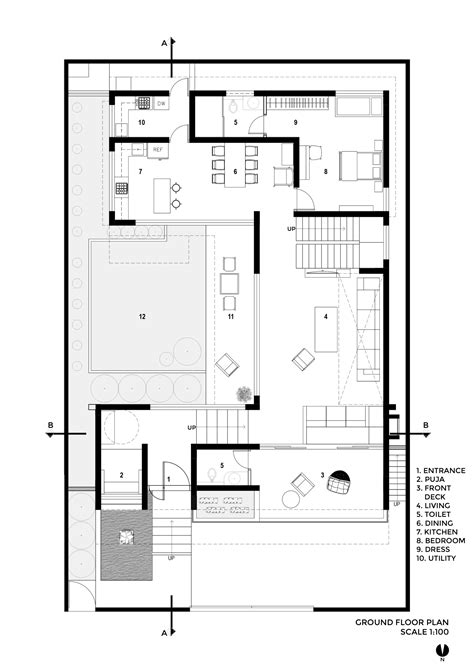 the floor plan for a modern house with two levels and an open living room, dining area