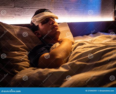 Young Handsome Sick or Unwell Man in Bed with a Flu or Fever Stock Image - Image of illness ...