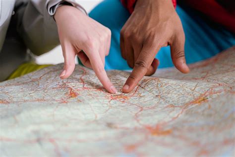 People Pointing Finger on Map · Free Stock Photo