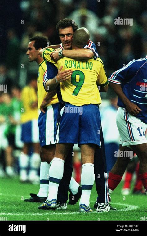 LAURENT BLANC CONSOLES RONALDO BRAZIL V FRANCE 12 July 1998 Stock Photo ...