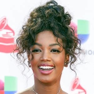 Iza - Age, Family, Bio | Famous Birthdays