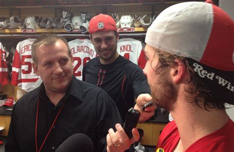 Rookie Brendan Smith lightens mood in Detroit Red Wings' dressing room by playing reporter ...