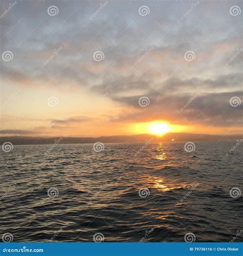 Sunrise Over Ocean stock photo. Image of yellow, reflection - 79736116