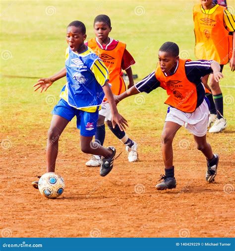 Diverse Children Playing Soccer Football at School Editorial Stock ...