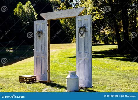 An Outdoor Wedding Arbor Prepared for a Rustic Wedding Stock Photo - Image of arch, married ...