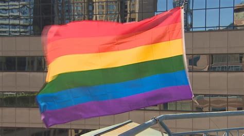 Pride flag over Toronto police HQ sign of 'changing times,' officer says | CBC News