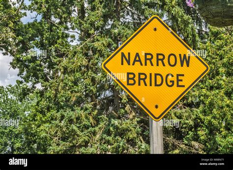 Narrow bridge ahead road sign hi-res stock photography and images - Alamy