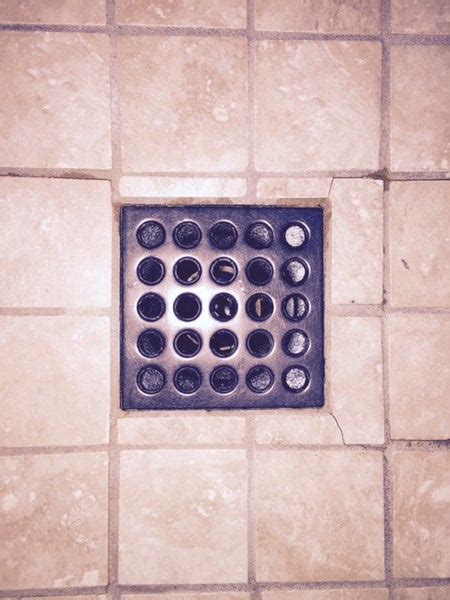 Rectangular shower drain cover removal tool? | DIY Home Improvement Forum