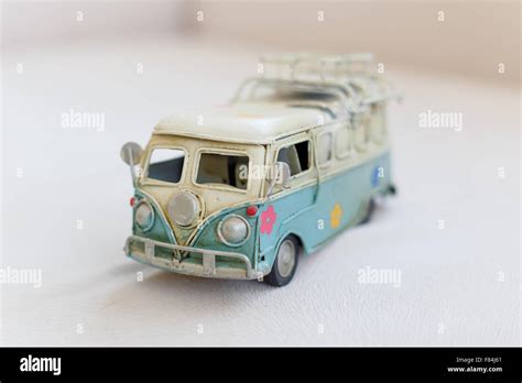 Close up detailed front view of white and blue vintage travel bus toy ...