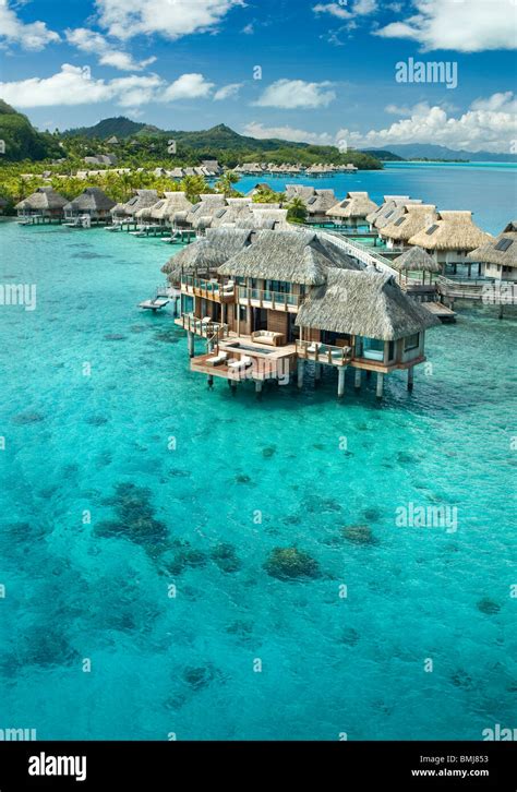 Overwater bungalows of Hilton bora Bora Nui Resort hotel in Bora bora Island Stock Photo - Alamy