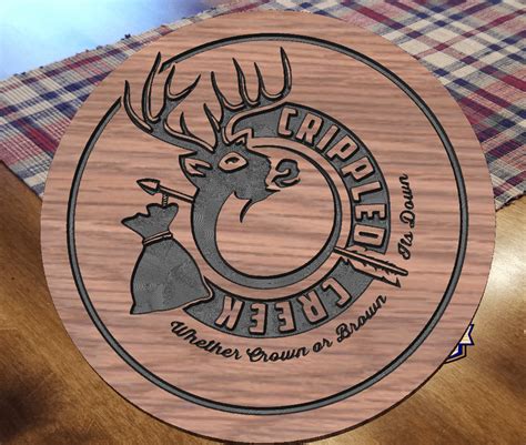 17" round carved custom logo sign - Maine Wood Signs