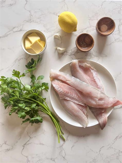 Baked Walleye with Lemon Garlic Butter and Herbs - Big Delicious Life