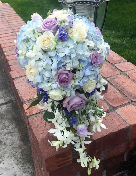 blue hydrangea and white roses cascading bouquet | Blue wedding bouquet, Blue hydrangea bridal ...