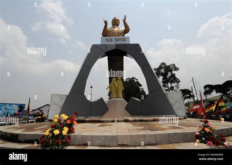 Flowers lay in front of the 'Karl's Monument' honoring 'People for People' foundation founder ...