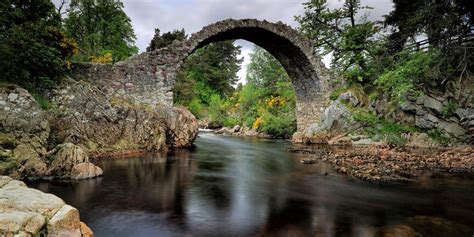 Old Packhorse Bridge Carrbridge, Speyside, Historic Attraction. Built in 1717. The pretty ...