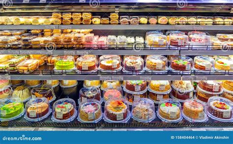 A Showcase of a Large Supermarket with Biscuit Cakes. Editorial Stock Image - Image of ...