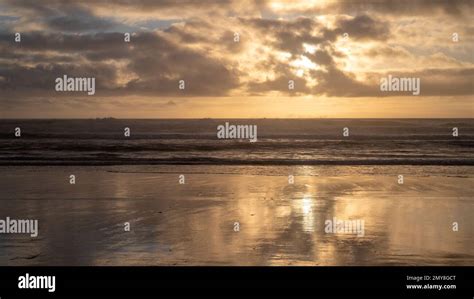 Sunset beach landscape Stock Photo - Alamy