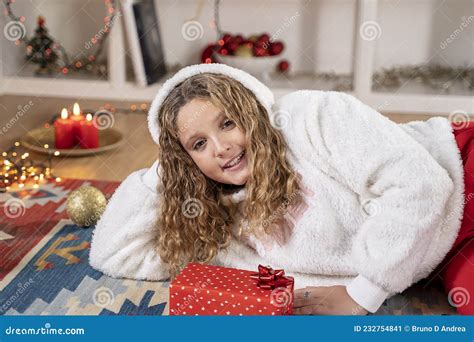 Little Girl with Christmas Gift Stock Image - Image of living ...