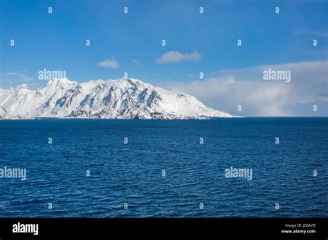 The bright snowy mountains of the Lofoten Islands Stock Photo - Alamy