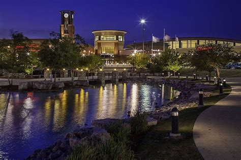 A view of Jordan Creek Town Centre from across a body of water ...