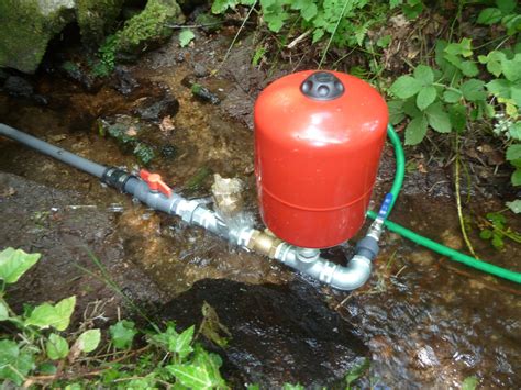 How to make a simple hydraulic ram pump to raise water from a stream without the need for ...