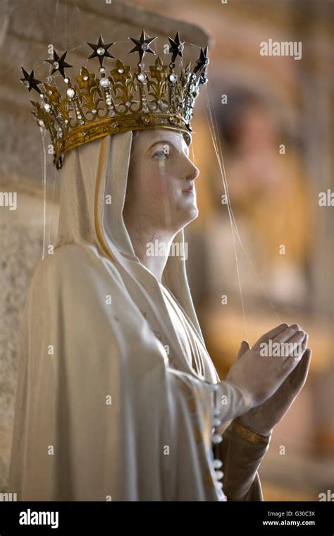 Statue of Virgin Mary wearing crown inside parish church, Saint ...