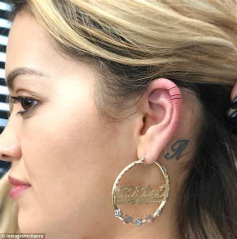 Rita Ora adds to her collection of tattoos | Daily Mail Online