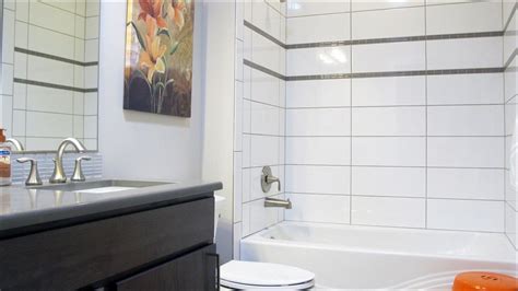 Large White Bathroom Wall Tiles | White tile bathroom walls, White bathroom tiles, Bathroom wall ...