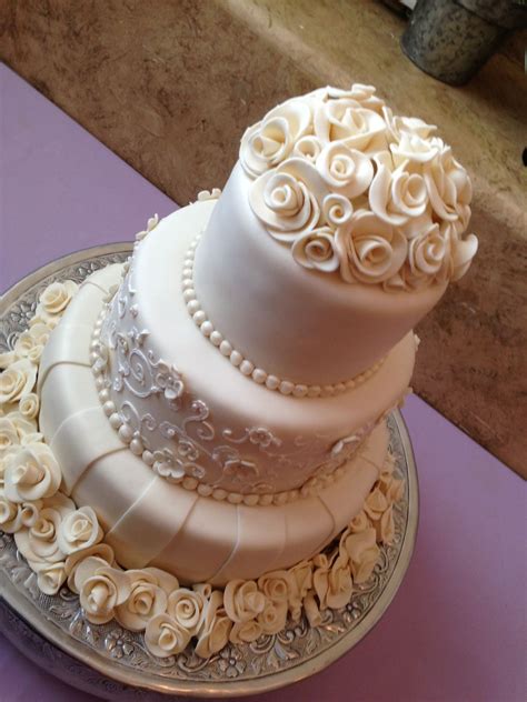 Ivory Chocolate Roses Wedding Cake - CakeCentral.com