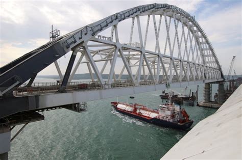 Putin drives truck over new controversial bridge linking Russia to Crimea peninsula | CBC News