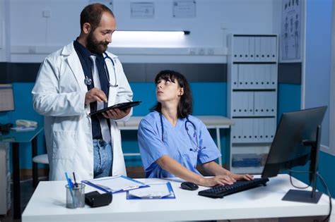 Free Photo | Doctor and nurse doing teamwork for medical checkup