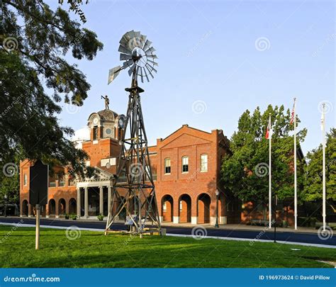 Liberty Park Windmill with Historic Grapevine City Hall in the ...