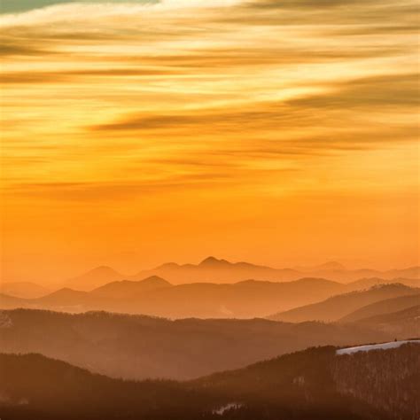 Premium Photo | Sunset in dramatic winter mountains