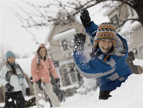 Three children having a snowball fight. — laughing, boy - Stock Photo ...