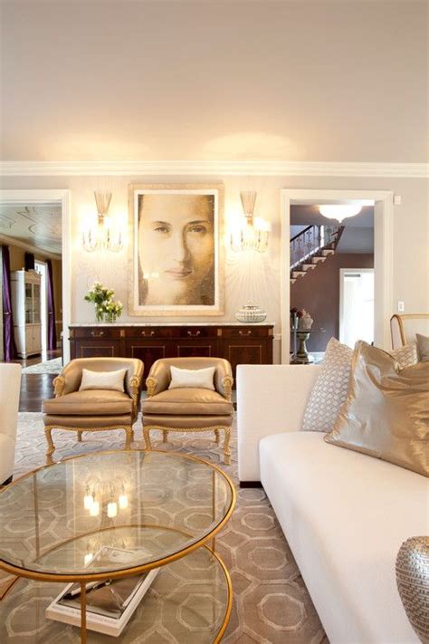 This living room combined both gold and silver accents along with a ...