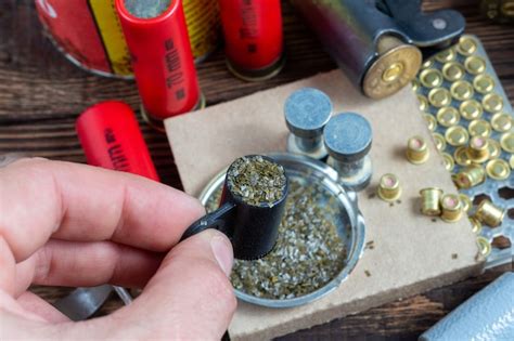 Premium Photo | Shotgun shells reloading process with special reload equipment