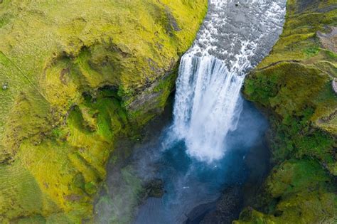 Premium Photo | Skogafoss waterfall by drone aerial view iceland