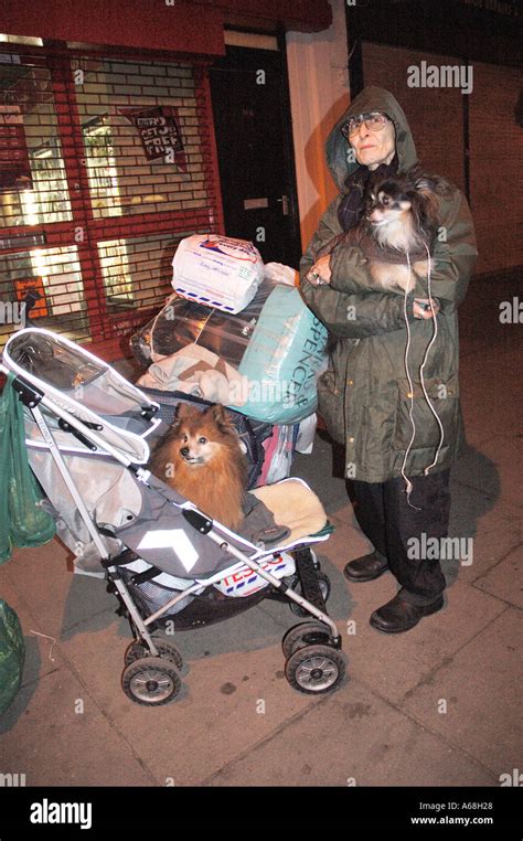 Woman who walks the street at night collecting reject discarded clothes and goods to give to the ...