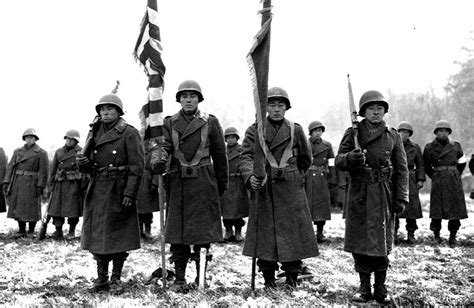 Japanese American soldiers in World War II fought the Axis abroad and ...