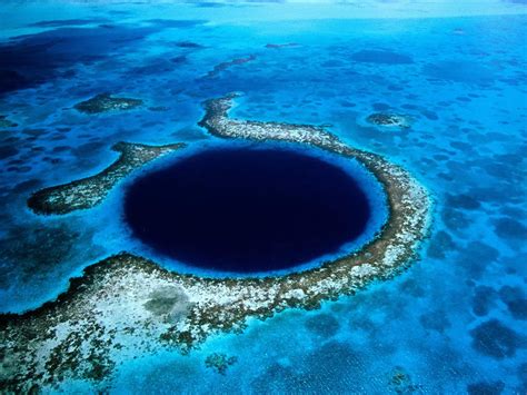 A blue hole is an underwater sinkhole. This one, dubbed the "Great Blue ...