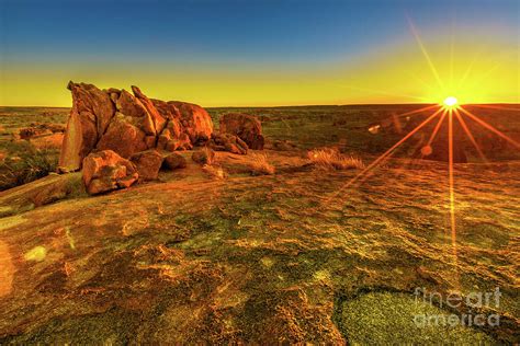 Panorama Devils Marbles sunset Photograph by Benny Marty