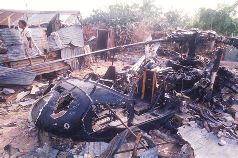 The real Black Hawk Down. Wreckage of an American helicopter in Mogadishu, Somalia, 1993 ...