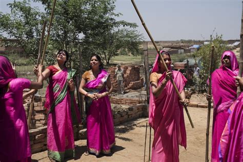 Meet the Gulabi Gang: stick-wielding women vigilantes standing up to abusers in India | South ...