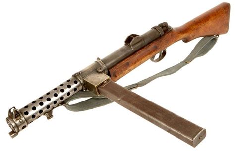 WWII Lanchester SMG. These were direct copies of the German MP 28/II Trip Wire Alarm, Revolver ...