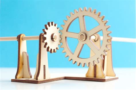 Turning right angle gears made from plywood | Laser cutting, Gears, Simple gear